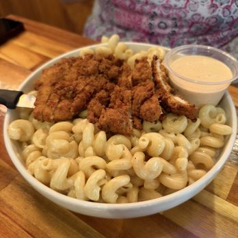 The Sneaky Beagle - Hometown Hero fried chicken and Mac n cheese with Sriracha sauce on the side. The sauce wasn't spicy at all. - Seafood Near Me - Myrtle Beach, South Carolina The Sneaky Beagle - Hometown Hero fried chicken and Mac n cheese with Sriracha sauce on the side. The sauce wasn't spicy at all. - Seafood Near Me - Myrtle Beach, South Carolina