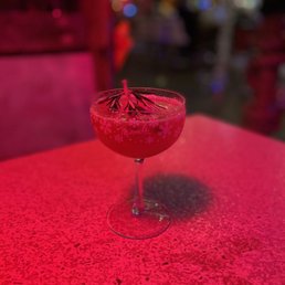 a cocktail in a wine glass a cocktail in a wine glass