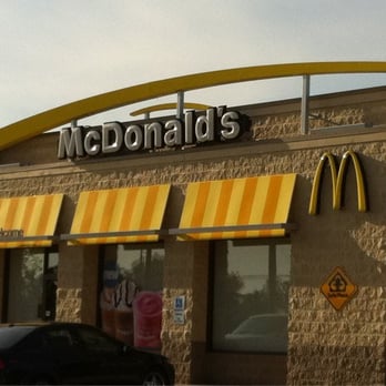 McDonald's - the front of a restaurant with a yellow awning - Fast Food Near Me - Springfield, Missouri McDonald's - the front of a restaurant with a yellow awning - Fast Food Near Me - Springfield, Missouri