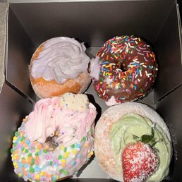 Ube donut, chocolate sprinkled, birthday donut and strawberry matcha