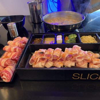 Slice Shabu - 6oz pork with side of 6oz beef belly. Hot miso on point - threw 11 hot drops in soup, 4/4 in the sauces! - Japanese Near Me - Fullerton, California