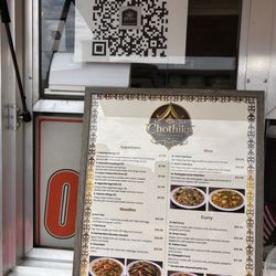 Menu on the window of the food truck