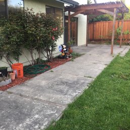 This was the Before of our old boring cracked grey concrete patio