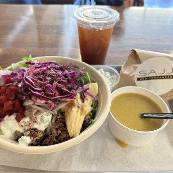 SAJJ Mediterranean - Pomegranate Chicken Lentil soup Pita chips Tamarind drink - Mediterranean Near Me - San Bruno, California SAJJ Mediterranean - Pomegranate Chicken Lentil soup Pita chips Tamarind drink - Mediterranean Near Me - San Bruno, California