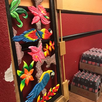 Tres Salsas Taqueria - a colorful mural of parrots - Mexican Near Me - Dallas, Texas Tres Salsas Taqueria - a colorful mural of parrots - Mexican Near Me - Dallas, Texas