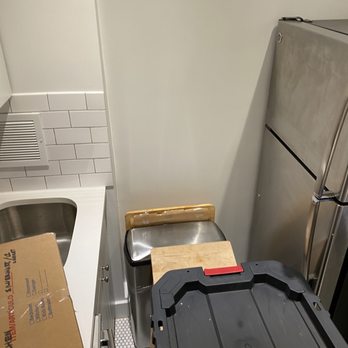 Oz Moving & Storage - Actually BENT a trash can. Made of metal. That's effort to destroy. - Movers Near Me - New York, New York