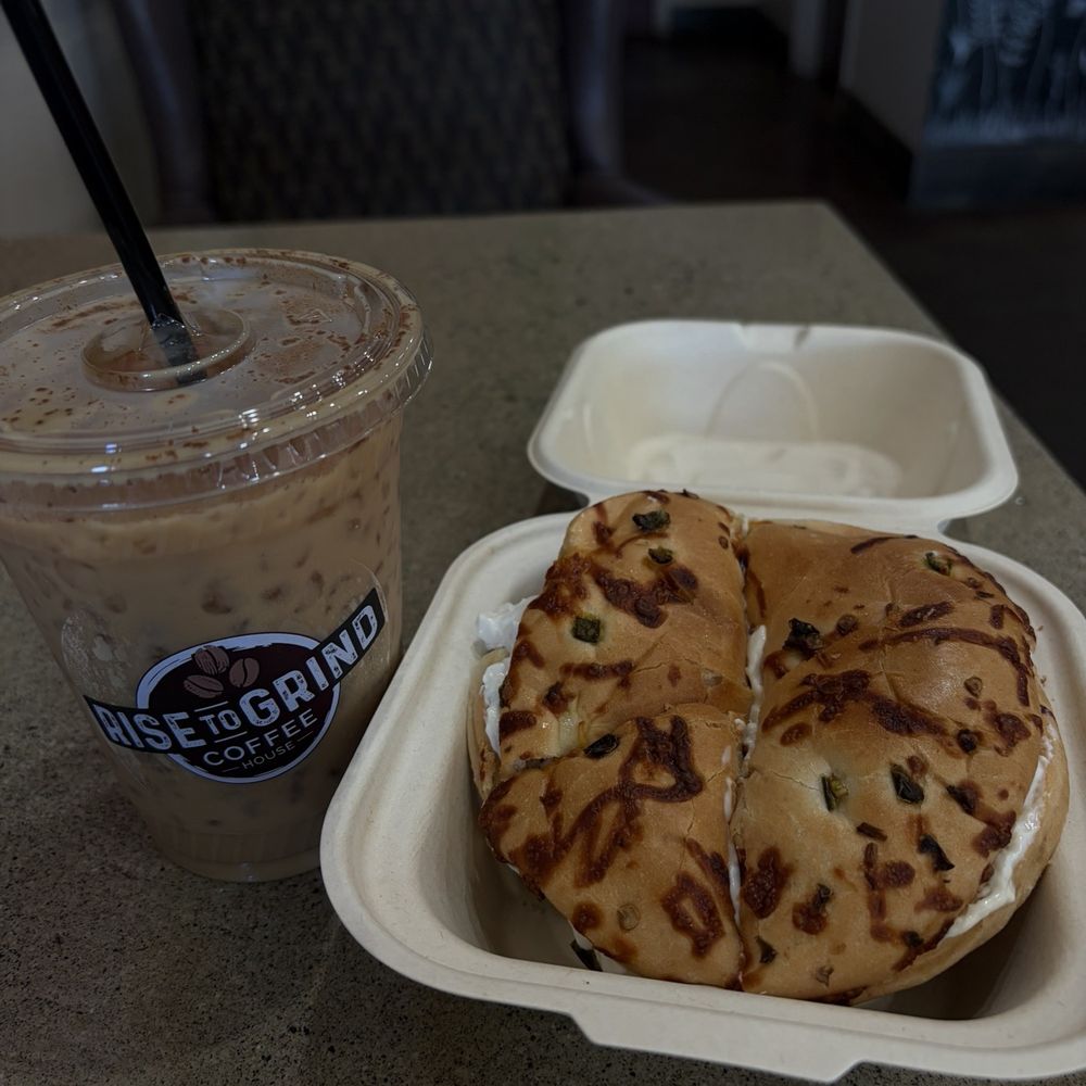 Oat milk latte & Jalapeno Cheddar Bagel with cream cheese Oat milk latte & Jalapeno Cheddar Bagel with cream cheese