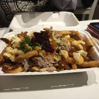 La Poutine - Here's a seasonal meal they offer aptly named the Thanksgiving Poutine, covered with turkey, stuffing and cranberry sauce that's awesome! - Poutineries Near Me - Edmonton, Alberta