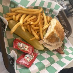 J Cafe - Smoked turkey and cheddar sandwich. We added bacon and avocado. There was another half to the sandwich as we split it.  Lots of meat!