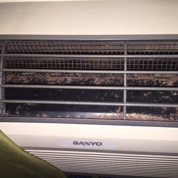La Quinta by Wyndham Shawnee - Looks like a little bit of rust and dirt-- heater/AC unit. - Hotels Near Me - Shawnee, Oklahoma