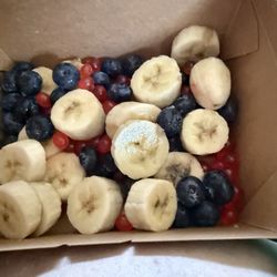 Grazing Thyme - Banana taco with blueberries and strawberry boba.