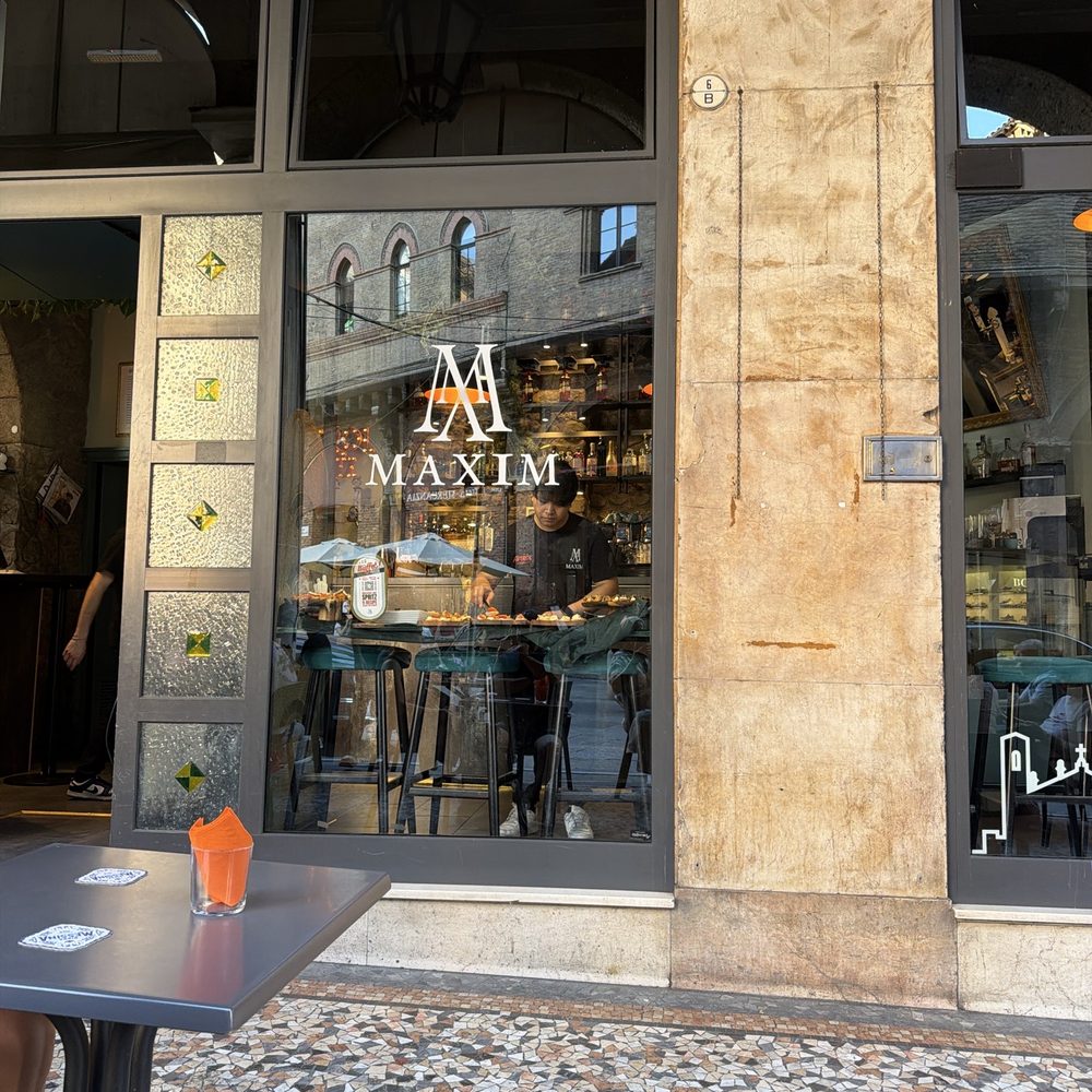 Caffè Maxim - Entrance to a fantastic spot for cocktails and a snack!!! Close to the City Center, try the Hugo Spritz - Cocktail Bars Near Me - Bologna, BO