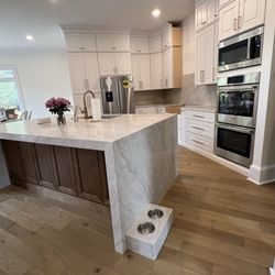 Solo Granite & Marble - Taj Mahal Quartz With custom dog bowl
