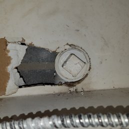 Hole left in my under cabinet drywall by Flow Right Plumbing