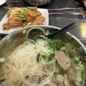 Pho Momma - 6. Half and Half Soup (meat balls and tendons) 1. Lean Beef, Flank, Brisket, Fat Brisket, Tripe and Tendon Soup - Noodles Near Me - Sacramento, California Pho Momma - 6. Half and Half Soup (meat balls and tendons) 1. Lean Beef, Flank, Brisket, Fat Brisket, Tripe and Tendon Soup - Noodles Near Me - Sacramento, California