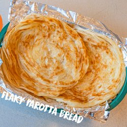 Kolapasi Indian Canteen - Buttery, flaky South Indian parotta Bread, a naan Killer! -- layers of crispy goodness that pair perfectly with any curry, wet or dry!