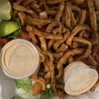 Peppers Mexicali Cafe - Calamari appetizer with spicy tartar sauce - Mexican Near Me - Pacific Grove, California Peppers Mexicali Cafe - Calamari appetizer with spicy tartar sauce - Mexican Near Me - Pacific Grove, California