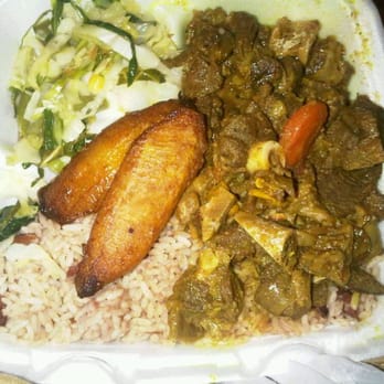 Golden Krust Caribbean Restaurant - Curry goat, rice and peas, cabbage, and plantains - Caribbean Near Me - Orlando, Florida Golden Krust Caribbean Restaurant - Curry goat, rice and peas, cabbage, and plantains - Caribbean Near Me - Orlando, Florida