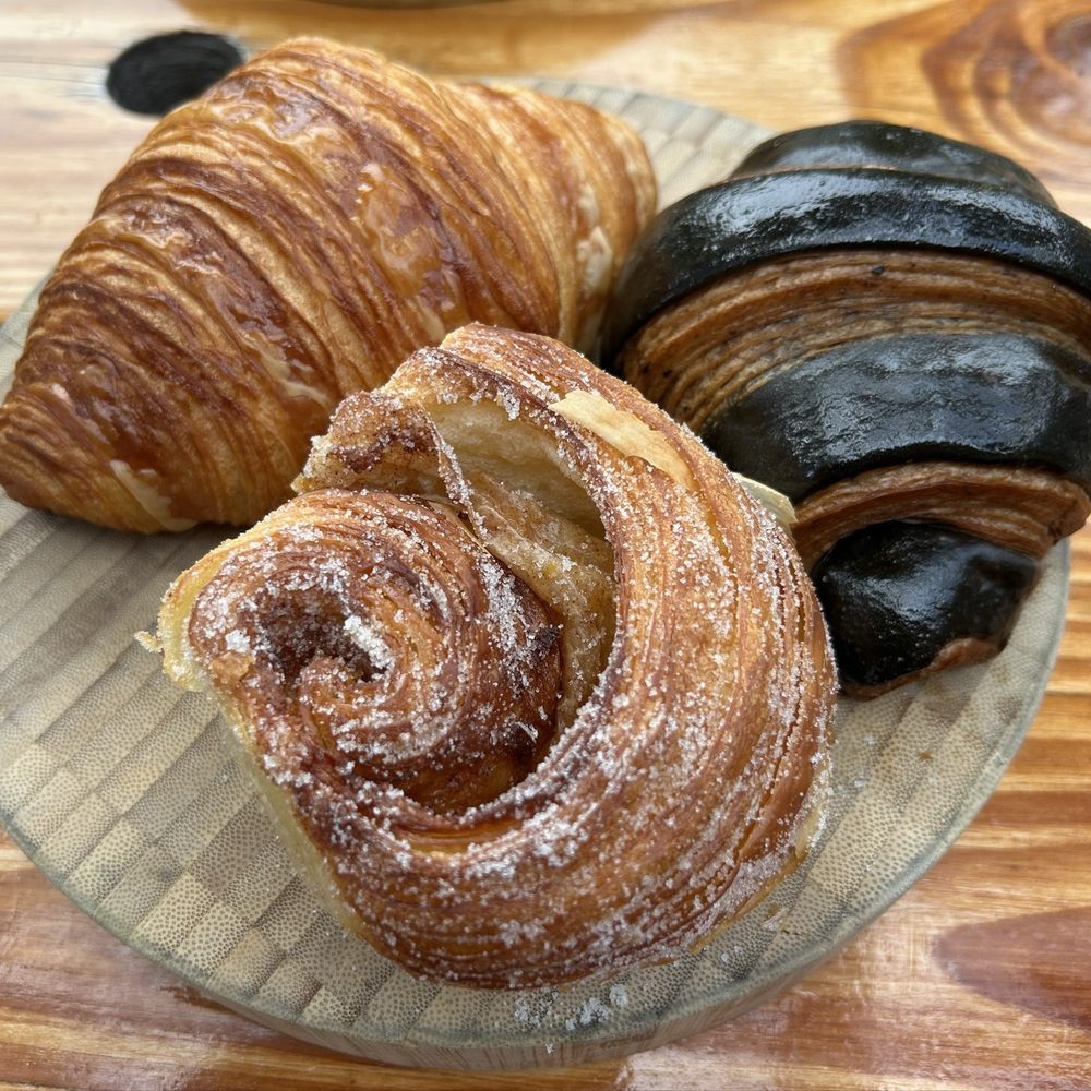 Izola - Signature Croissant  Morning Bun Moroccan Olive Chocolate Croissant - Bakeries Near Me - San Diego, California