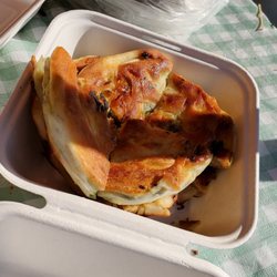 St. Albert Farmers Market - Green onion cake man $10 for 4