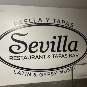 Cafe Sevilla - Parking structure advertisement on second floor - Spanish Near Me - Costa Mesa, California