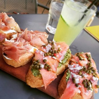 Postino Central - Prosciutto with fig and smoked salmon with pesto bruschetta - Wine Bars Near Me - Phoenix, Arizona Postino Central - Prosciutto with fig and smoked salmon with pesto bruschetta - Wine Bars Near Me - Phoenix, Arizona