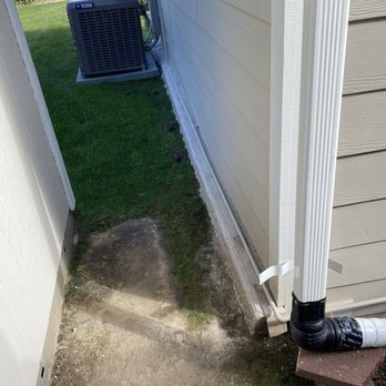 Premium Roof Services - Where one of the downspouts was installed causing the flooding. Put water right into the home. - Roofing Near Me - Spring Valley, California