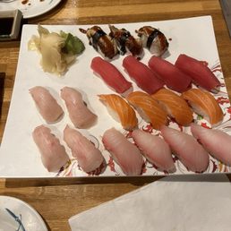 Selection of Nigiri: eel, tuna, salmon, red snapper(I think), and yellowtail to the left. Selection of Nigiri: eel, tuna, salmon, red snapper(I think), and yellowtail to the left.