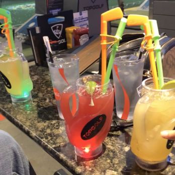 Topgolf - Golfbag drink -- available in two flavors berry & pineapple - New American Near Me - Birmingham, Alabama Topgolf - Golfbag drink -- available in two flavors berry & pineapple - New American Near Me - Birmingham, Alabama