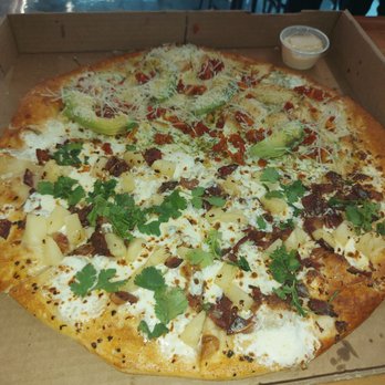Mondo Pizza - Half Pineapple paradise and half west coast pesto chicken - Pizza Near Me - Dallas, Texas Mondo Pizza - Half Pineapple paradise and half west coast pesto chicken - Pizza Near Me - Dallas, Texas