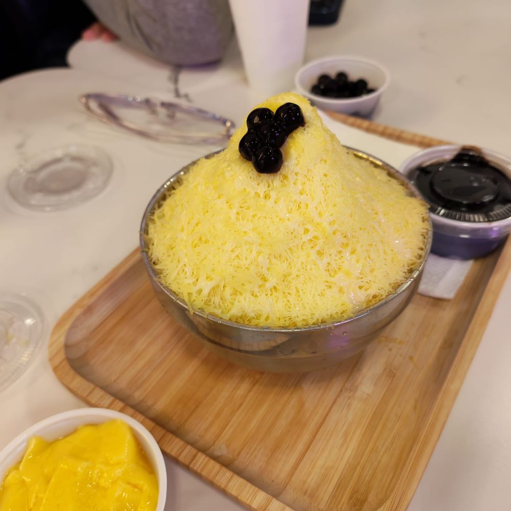 CAFFE iN - Mango shaved snow (Large for $7.95 no toppings included) + Boba + Pudding + Grass Jelly + Condensed Milk - Bubble Tea Near Me - Plano, Texas CAFFE iN - Mango shaved snow (Large for $7.95 no toppings included) + Boba + Pudding + Grass Jelly + Condensed Milk - Bubble Tea Near Me - Plano, Texas