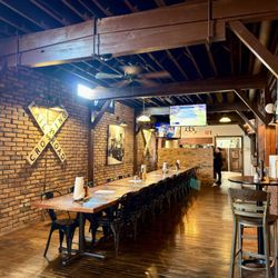 The Station Taphouse and Eatery - Group seating, bar, kitchen