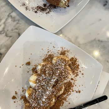Sweet Moon - two plates of dessert on a marble table - Shaved Ice Near Me - Seattle, Washington