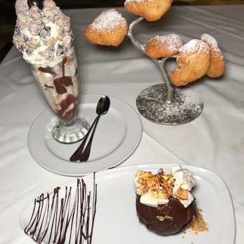 Steak 48 - Dessert: Cookies and Cream popcorn Shake, Triple Chocolate Almond Bomb (Gluten Free), Beignet Tree - Steakhouses Near Me - Chicago, Illinois Steak 48 - Dessert: Cookies and Cream popcorn Shake, Triple Chocolate Almond Bomb (Gluten Free), Beignet Tree - Steakhouses Near Me - Chicago, Illinois