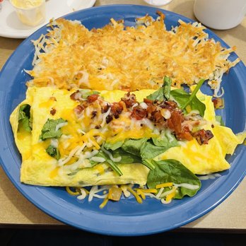 Café by Country Kitchen - a plate of omelet with spinach and bacon - Coffee & Tea Near Me - Ottumwa, Iowa Café by Country Kitchen - a plate of omelet with spinach and bacon - Coffee & Tea Near Me - Ottumwa, Iowa