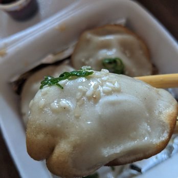 Big Beef Bowl Hand-Pulled Noodle - Close-up pic of the Shanghai pan-fried bao - Noodles Near Me - Markham, Ontario Big Beef Bowl Hand-Pulled Noodle - Close-up pic of the Shanghai pan-fried bao - Noodles Near Me - Markham, Ontario