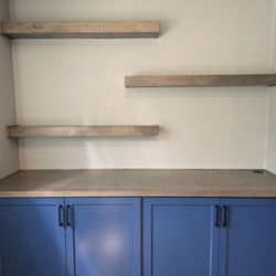 Expert craftsmanship and attention to detail. Love the edging around the shelves and top. They even added a grommet for cords.