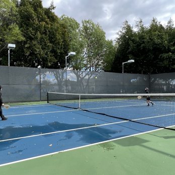 Heather Park - Rainy day pickle ball on tennis court. :) - Parks Near Me Heather Park - Rainy day pickle ball on tennis court. :) - Parks Near Me