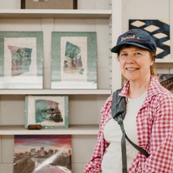 Pine Street Barbershop and Salon - Local artist with her displayed work at Pine Street Barbershop and Salon