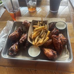 Famous wings in Carolina BBQ and Buffalo. Famous wings in Carolina BBQ and Buffalo.