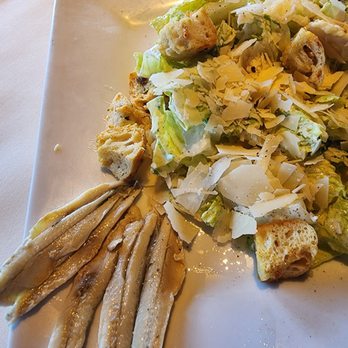 Shadowbrook - Cesar Salad with pickled white sardines on the side. They are optional! - American Near Me - Capitola, California