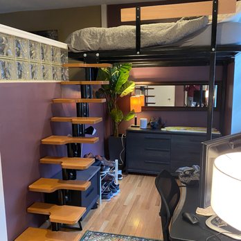 JP Builders - Finished product of the lofted bed, steps, and railing JP Builders built. - General Contractors Near Me