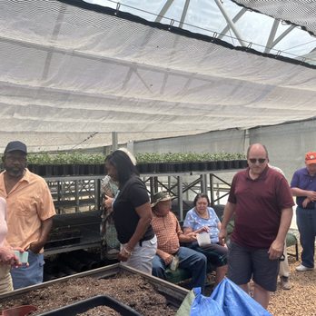 Table Rock Tea Company - a group of people in a greenhouse - Coffee & Tea Near Me - Pickens, South Carolina