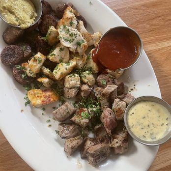 Jill's Place - Protein appetizer with steak bites, chicken and sausage - Steakhouses Near Me - Santa Barbara, California Jill's Place - Protein appetizer with steak bites, chicken and sausage - Steakhouses Near Me - Santa Barbara, California