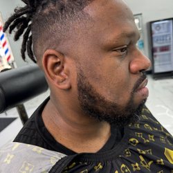 Mane Cave Barbershop - Fade and beard trim