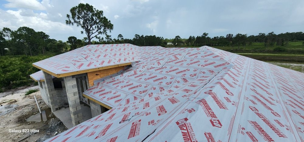 Slide of Paradise Roofing Services