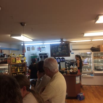 Neptune Market - customers waiting in line at the counter - Grocery Near Me - Harvey Cedars, New Jersey Neptune Market - customers waiting in line at the counter - Grocery Near Me - Harvey Cedars, New Jersey