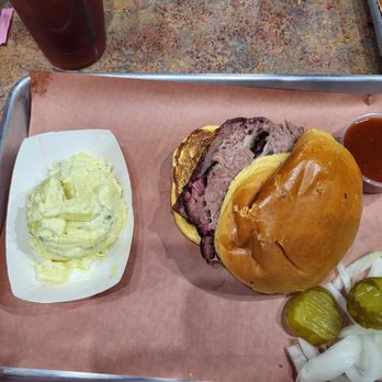 The Brisket House - Sliced Brisket sandwich with mustard potato salad - Barbeque Near Me - Deer Park, Texas