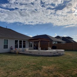 a patio and pergolated area