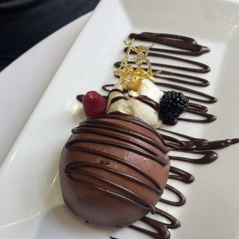 The Olde Pink House - Peanut Butter and Praline mousse bombe - Southern Near Me - Savannah, Georgia The Olde Pink House - Peanut Butter and Praline mousse bombe - Southern Near Me - Savannah, Georgia